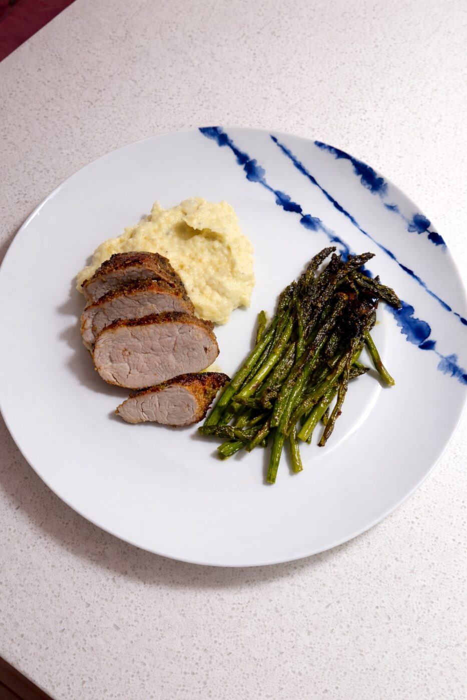Sliced pork tenderloin with polenta and roasted asparagus — weekly meal prep Alpharetta GA