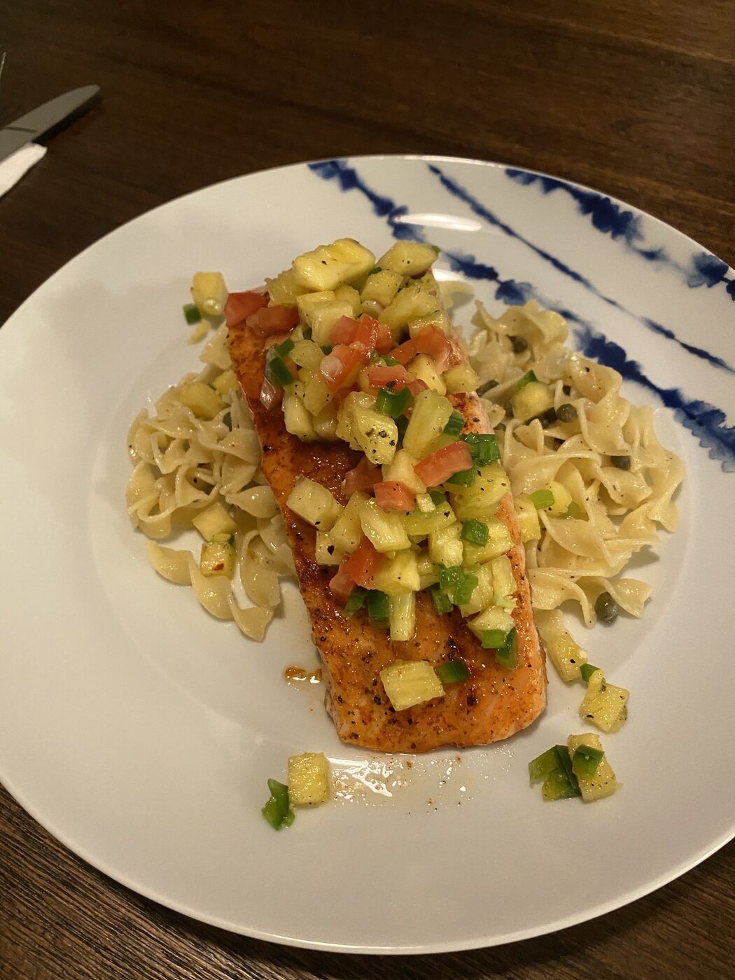 Blackened salmon with pineapple salsa over egg noodles — meal prep service Alpharetta GA